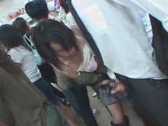 Japanese Nudes presents: She strokes his cock on a train